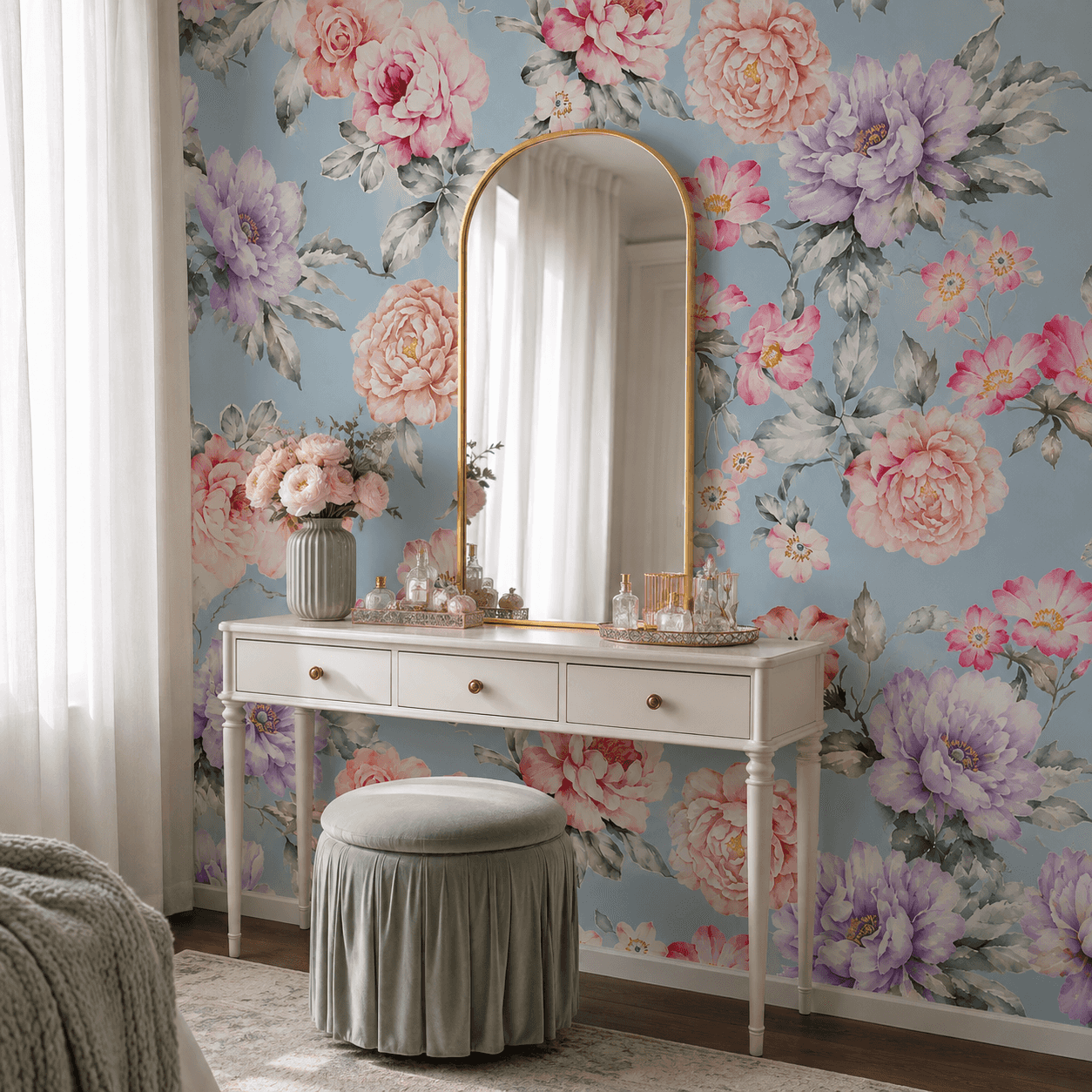 Watercolor floral wallpaper behind a vanity with arched mirror